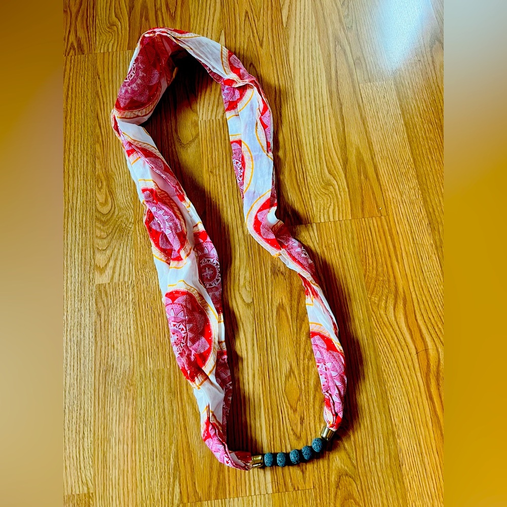 Scarf with lava beads for essential oils.